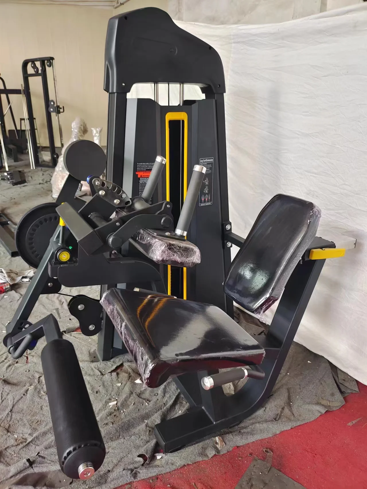 Sprzęt do ćwiczeń na siłowni,  – Home Gym Leg Extension recenzja i cena